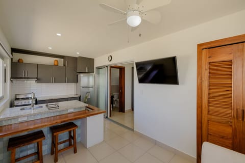 Design House, 1 Double Bed, Beach View | Private kitchen | Microwave, coffee/tea maker, cleaning supplies