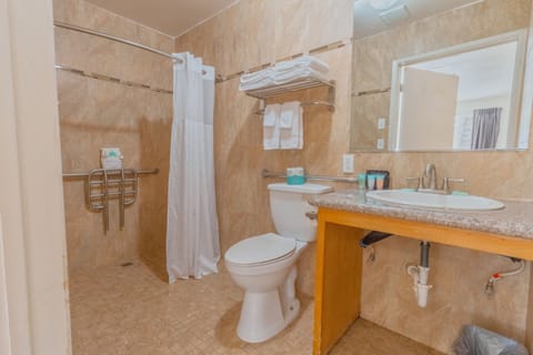 Accessible Double Queen Room | Bathroom | Combined shower/tub, free toiletries, hair dryer, towels