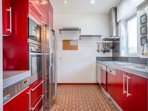 Villa | Private kitchen | Microwave, electric kettle, highchair