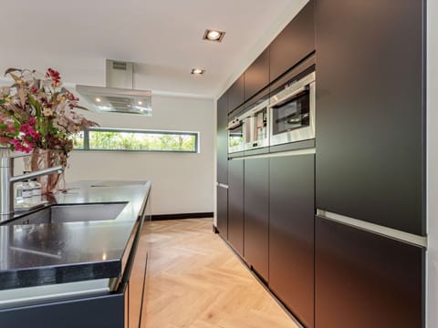 Villa | Private kitchen | Electric kettle, highchair