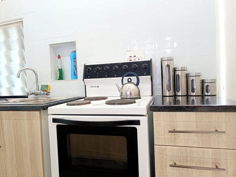 Apartment | Private kitchen | Fridge, microwave, oven, stovetop