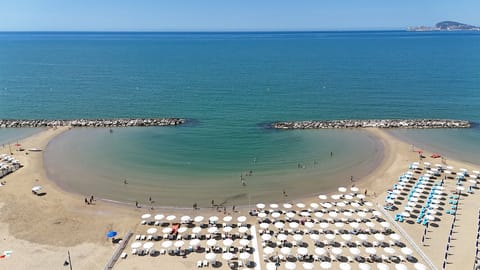 On the beach, white sand