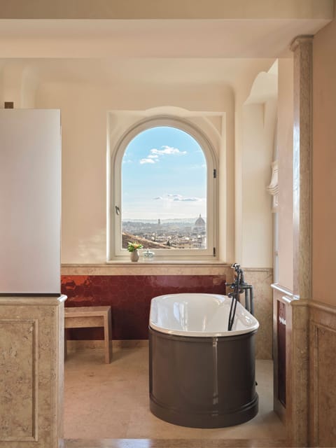Suite, 1 Bedroom (Fiore) | Bathroom | Separate tub and shower, hair dryer, bathrobes, slippers