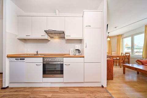 Classic Condo | Private kitchen | Mini-fridge, stovetop, toaster, highchair