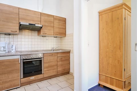 Classic Apartment | Private kitchen | Mini-fridge, stovetop, toaster, highchair