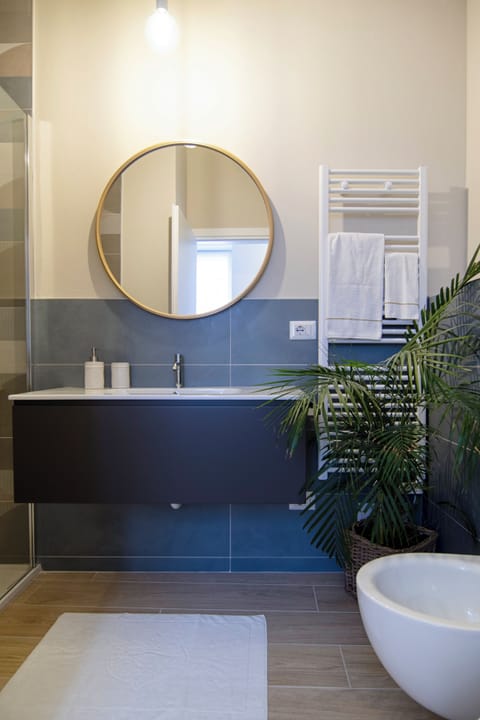 Double Room, Balcony, Lake View | Bathroom | Shower, rainfall showerhead, hair dryer, slippers