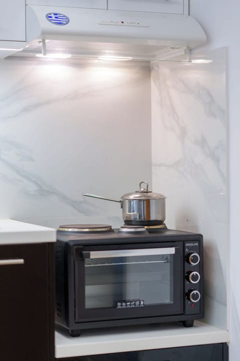 Mini-fridge, microwave, stovetop, electric kettle