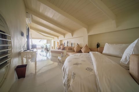 Luxury Suite, Beach View | In-room safe, free WiFi, bed sheets