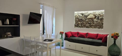 Superior Apartment | Living area | Flat-screen TV