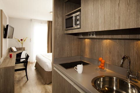 Premium Studio, Kitchenette | Private kitchen | Fridge, microwave, stovetop, cookware/dishes/utensils