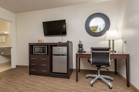 Premium bedding, down comforters, Tempur-Pedic beds, desk