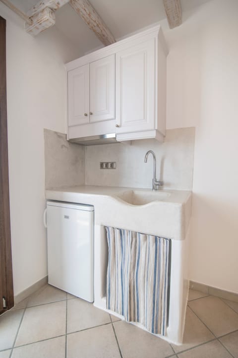 Deluxe Triple Room, Oceanfront | Private kitchenette | Full-size fridge, electric kettle, highchair, cookware/dishes/utensils