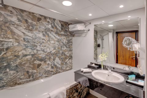 Shower, free toiletries, hair dryer, slippers