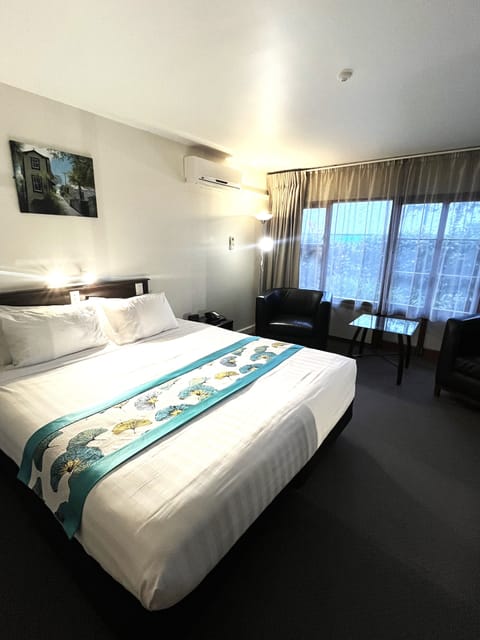 Deluxe Room | Blackout drapes, iron/ironing board, free WiFi, bed sheets