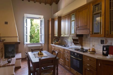 La Casa del Guardiacaccia | Living area | Flat-screen TV, fireplace