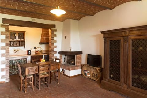 La Rimessa dello Stalliere | Living area | Flat-screen TV, fireplace