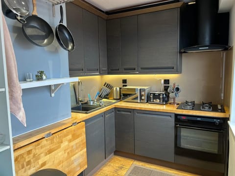 Apartment | Private kitchen | Fridge, microwave, oven, stovetop