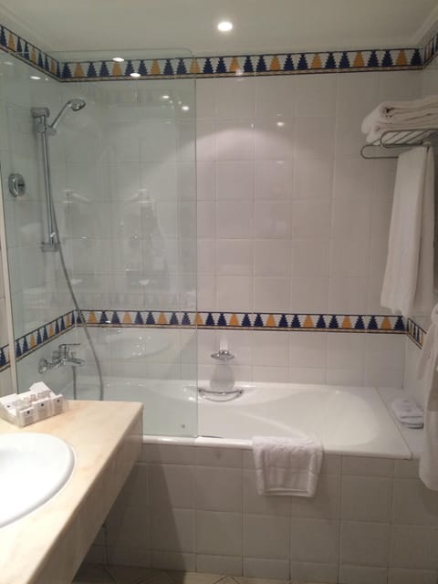 Combined shower/tub, free toiletries, hair dryer, bathrobes