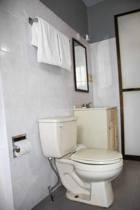 Economy Double Room | Bathroom | Bathtub, towels, toilet paper