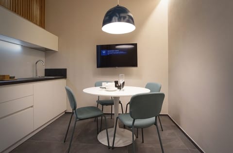 Deluxe Apartment | Living area | TV