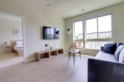 Deluxe Apartment, 2 Bedrooms, Balcony, City View | Living area | 45-inch Smart TV with cable channels