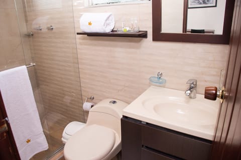 Standard Double Room | Bathroom | Shower, hair dryer, towels, soap