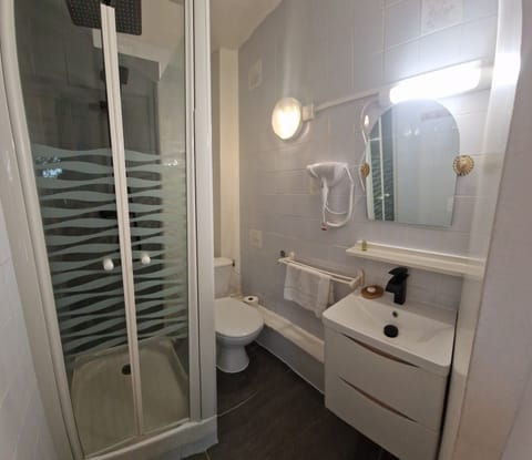 Standard Double Room, Courtyard View | Bathroom | Shower, hair dryer, towels, soap