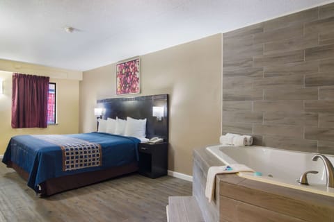 Suite, 1 King Bed, Smoking | Desk, blackout drapes, cribs/infant beds, rollaway beds