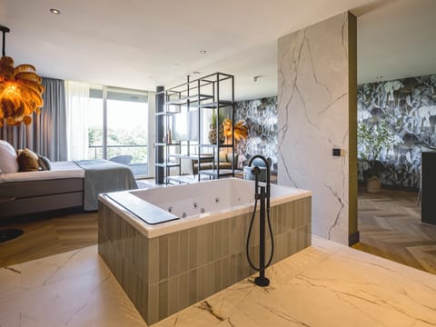 Be Serene Suite | Bathroom | Separate tub and shower, free toiletries, towels