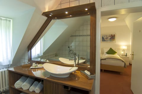 Suite, 2 Bedrooms | Bathroom | Eco-friendly toiletries, hair dryer, towels