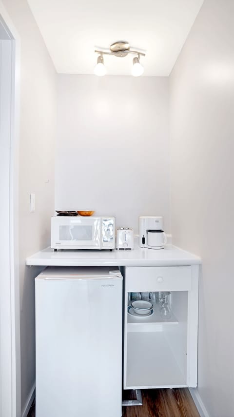 Mini-fridge, microwave, coffee/tea maker, toaster