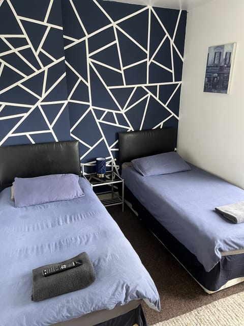 Economy Twin Room, Garden View | Iron/ironing board, free WiFi, bed sheets