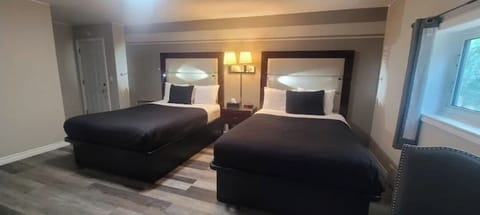 Standard Room, 2 Queen Beds | Desk, free WiFi, bed sheets