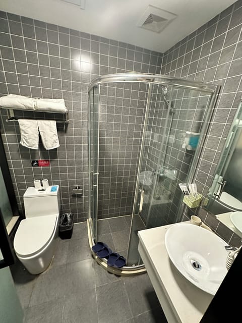 Economy Double Room, 1 Queen Bed | Bathroom | Shower, rainfall showerhead, hair dryer, towels