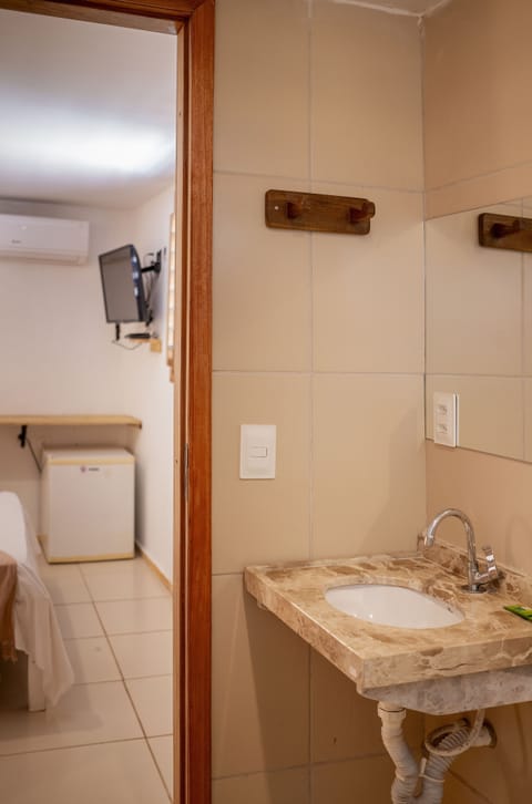 Twin Room | Bathroom | Shower, rainfall showerhead, hair dryer, towels