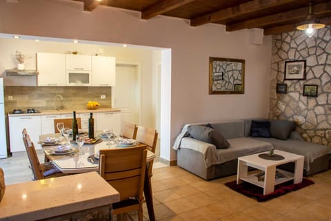 House (Two Bedroom Holiday Home with Sea Vie) | Living room | 32-inch flat-screen TV with satellite channels