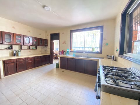 Villa, Pool View | Private kitchen | Fridge, microwave, oven, stovetop