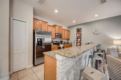 Panoramic Townhome, Resort View | Private kitchen | Full-size fridge, microwave, oven, dishwasher