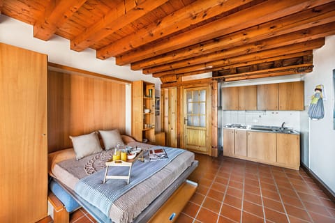 Apartment, Pool View | Living area | 35-inch flat-screen TV with digital channels