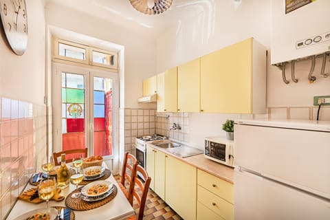 Apartment, Balcony | Private kitchen | Full-size fridge, microwave, oven, stovetop