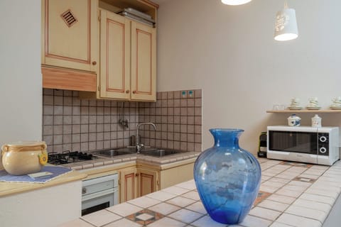 Apartment | Private kitchen | Full-size fridge, microwave, oven, stovetop