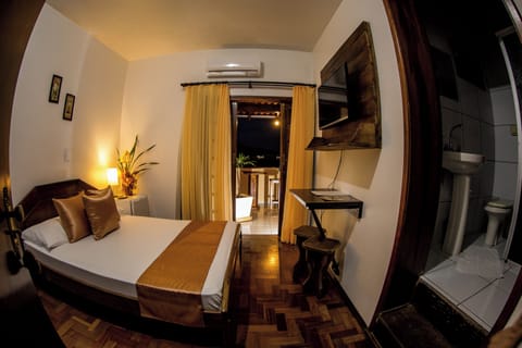 Economy Suite, 1 Double Bed, Private Bathroom, Courtyard View | Minibar, desk, laptop workspace, free WiFi