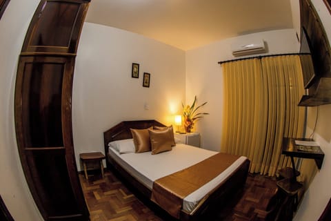 Economy Suite, 1 Double Bed, Private Bathroom, Courtyard View | Minibar, desk, laptop workspace, free WiFi