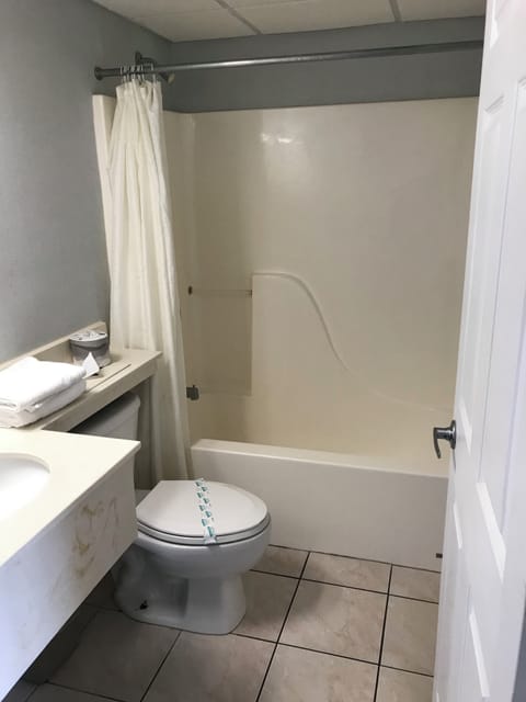 Family Suite, Balcony, Beach View | Bathroom | Combined shower/tub, hair dryer, towels, toilet paper