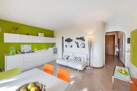 Apartment, Pool View | Private kitchen | Fridge, microwave, oven, stovetop