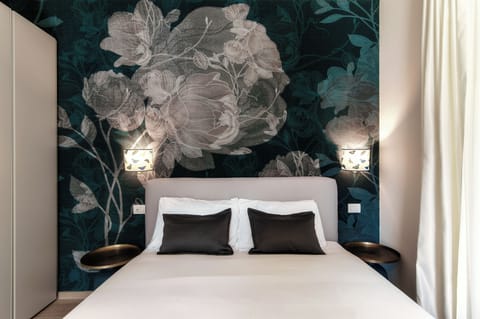 Deluxe Quadruple Room, Lake View | Minibar, in-room safe, desk, soundproofing