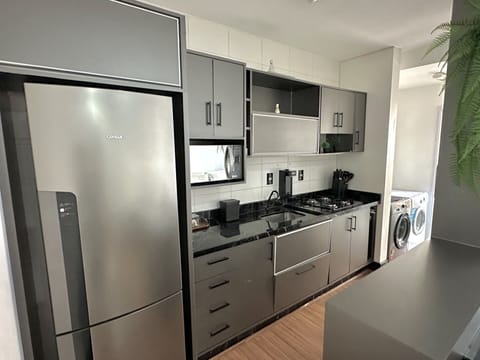 Family Apartment | Private kitchen | Microwave, dishwasher, cookware/dishes/utensils