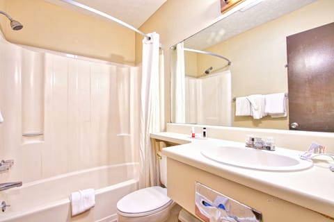 Standard Room, 2 Queen Beds, Smoking | Bathroom | Combined shower/tub, free toiletries, hair dryer, towels