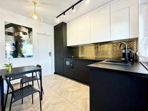 Comfort Apartment | Private kitchen | Full-size fridge, microwave, oven, stovetop