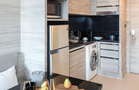 Suite, 1 Bedroom | Private kitchen | Full-size fridge, microwave, stovetop, cookware/dishes/utensils